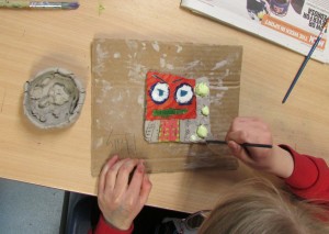 Op art tile painting at childrens after school art club led by artist Karen Logan