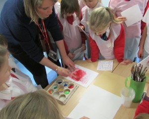 Print making demonstration at children's art school club