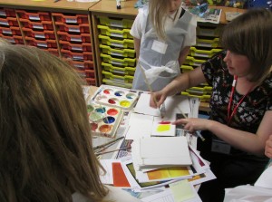 Artist Karen Logan demonstrates different uses of colour at the Children's Art School After School Club