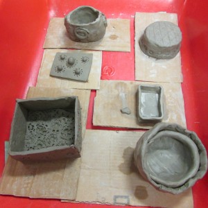 An array of pots made at the Children's Art School after school club led by artist Karen Logan